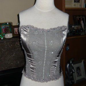 Womans gray and silver embellished corset Siz 8 clip in front and tie in back